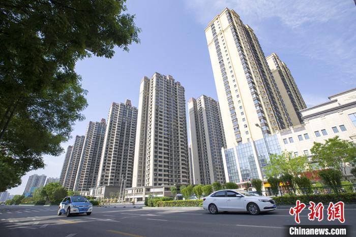 資料圖：車輛從一樓盤前經(jīng)過。 <a target='_blank' href='/'><p  align=