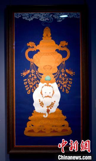圖為5月16日，展覽中的新創(chuàng)唐卡作品《瑞象承香》?！±盍?攝